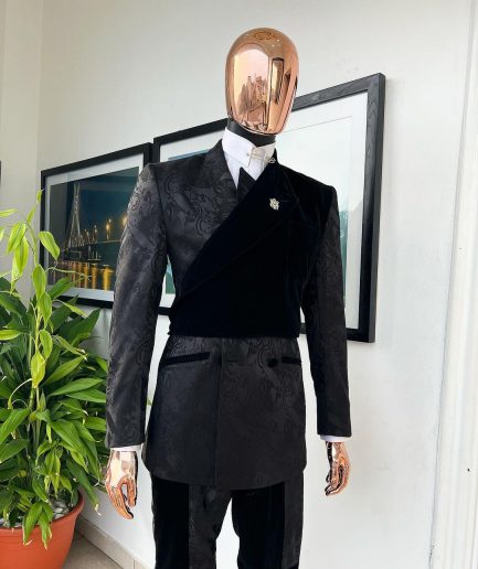 A charcoal black “equalizer” quadruple breasted, knitted, peak lapel with velvet tuxedo jacquard suit