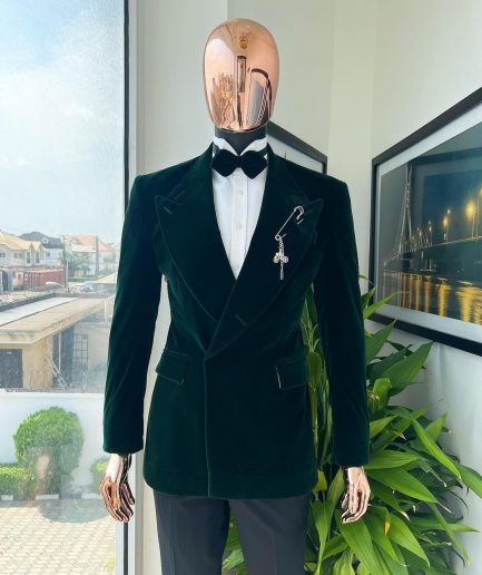 A Sacramento green “agama” soaked velvet peak lapel single button double breasted suit