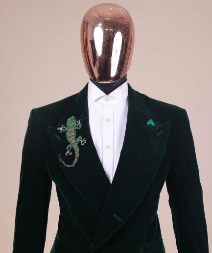 A Sacramento green “agama” soaked velvet peak lapel single button double breasted suit