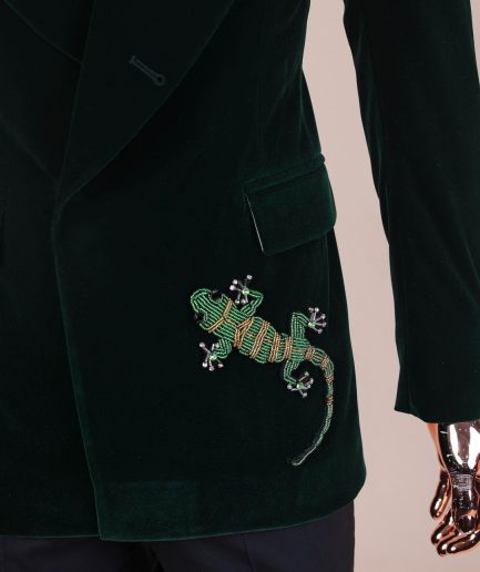 A Sacramento green “agama” soaked velvet peak lapel single button double breasted suit