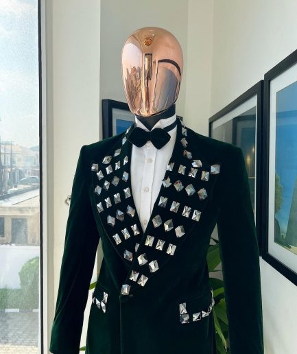 A Sacramento green soaked velvet peak lapel single button double breasted suit