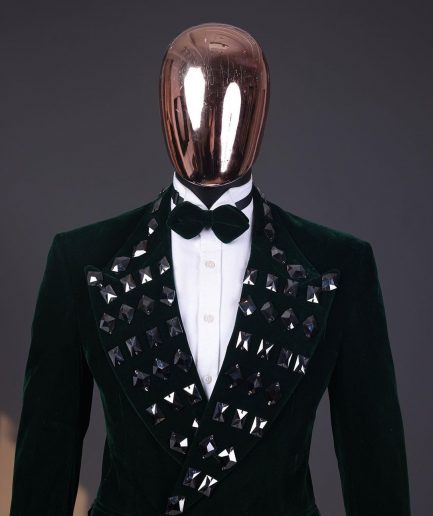A Sacramento green soaked velvet peak lapel single button double breasted suit