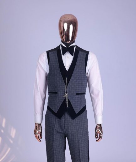 A grey octagonal patterned, navy blue mix, wide notch lapel, single button suit