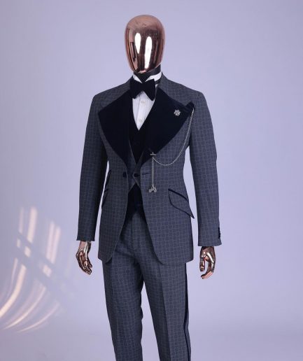 A grey octagonal patterned, navy blue mix, wide notch lapel, single button suit