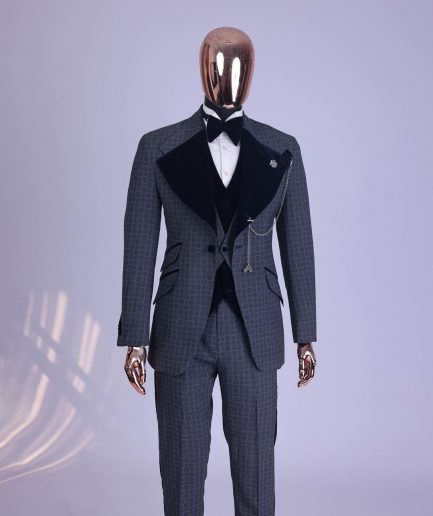 A grey octagonal patterned, navy blue mix, wide notch lapel, single button suit