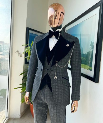 A grey octagonal patterned, navy blue mix, wide notch lapel, single button suit