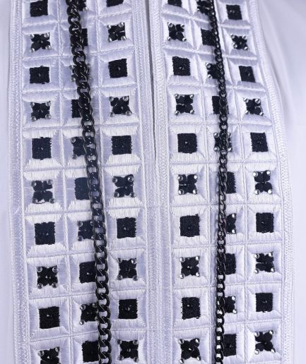 A White, Connected Square Embroidery Design With Matching Black And Silver Swarovski Stone Details Agbada