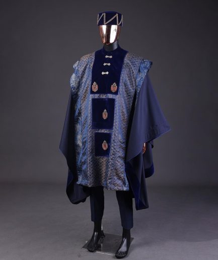 A “krosscut” layered, minted Gold, Skye, navy and admiral blue mix metallic jacquard front cut agbada.