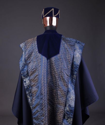 A “krosscut” layered, minted Gold, Skye, navy and admiral blue mix metallic jacquard front cut agbada.
