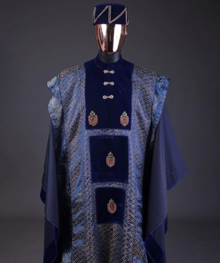 A “krosscut” layered, minted Gold, Skye, navy and admiral blue mix metallic jacquard front cut agbada.