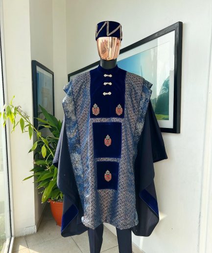 A “krosscut” layered, minted Gold, Skye, navy and admiral blue mix metallic jacquard front cut agbada.