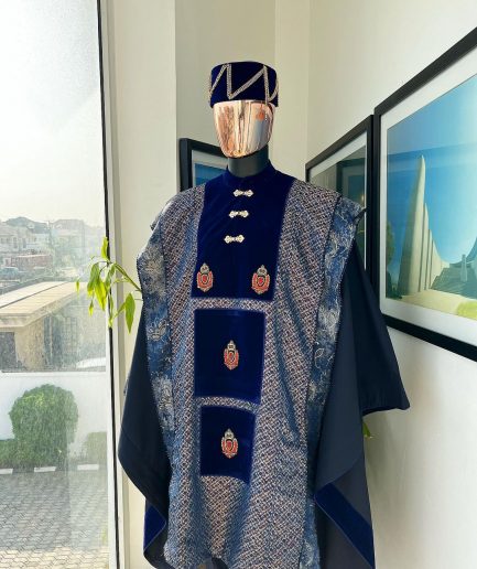 A “krosscut” layered, minted Gold, Skye, navy and admiral blue mix metallic jacquard front cut agbada.