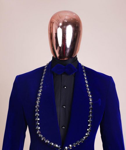 An Admiral Blue velvet shawl lapel tuxedo suit, laced with jet hematite Swarovski stones