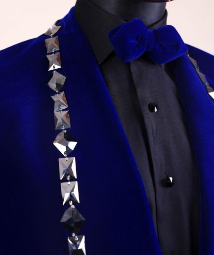 An Admiral Blue velvet shawl lapel tuxedo suit, laced with jet hematite Swarovski stones
