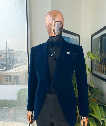 A Midnight Blue, Soaked Velvet Fabric, Knitted, Wide Peak Lapel Tuxedo Suit.