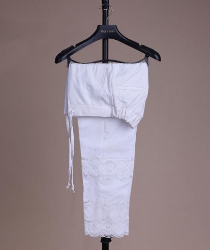 A bright white, Swiss patterned lace, front flap, 3/4 sleeve African kaftan native.