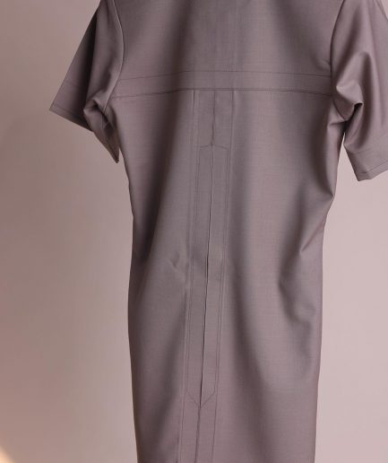 A fossil grey, return front flap with clear view Swarovski button details, short sleeve African senator kaftan native.