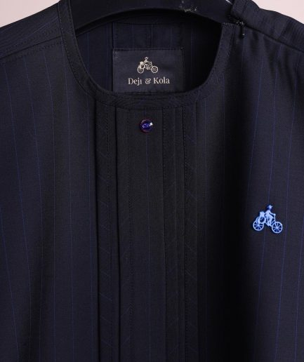 A charcoal black and admiral blue pencil stripe, invisible neckline zip line with layered front flap details, short sleeve African senator kaftan native.