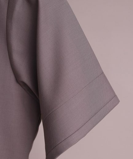 A fossil grey, return front flap with clear view Swarovski button details, short sleeve African senator kaftan native.