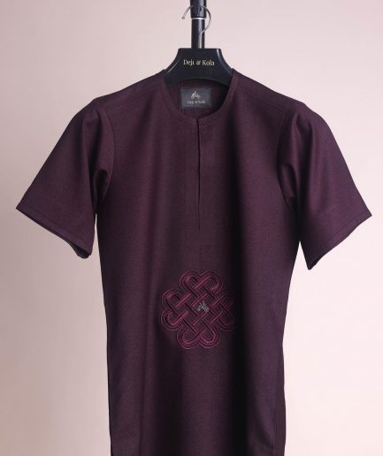 A burgundy, zipline with lower embroidery details, short sleeve African senator kaftan native.