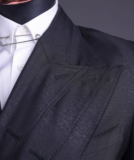 A “quad” charcoal black, 8 button, knitted,Peak lapel “4” breasted suit