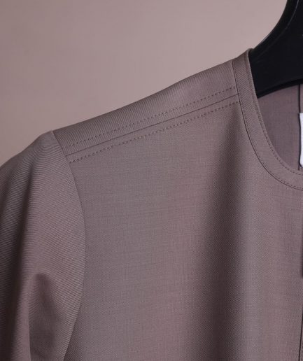 A fossil grey, return front flap with clear view Swarovski button details, short sleeve African senator kaftan native.