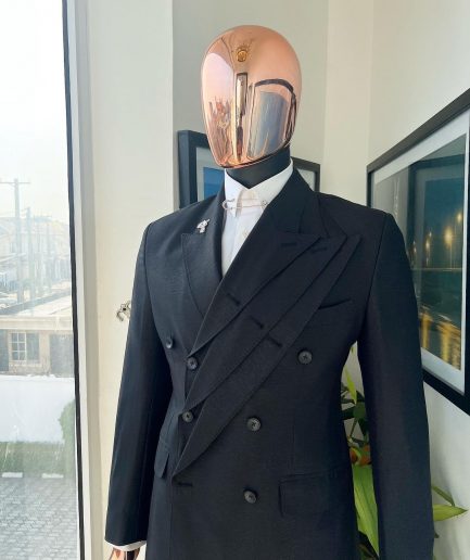 A “quad” charcoal black, 8 button, knitted,Peak lapel “4” breasted suit