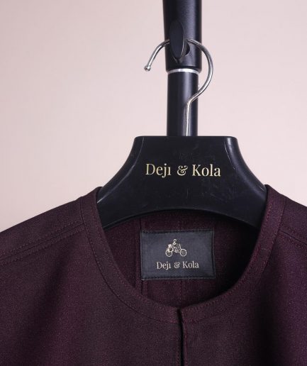 A burgundy, zipline with lower embroidery details, short sleeve African senator kaftan native.