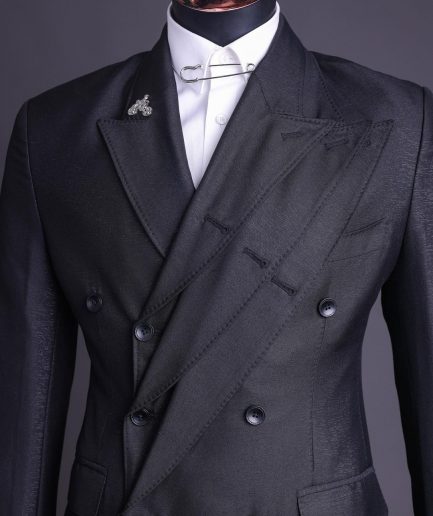 A “quad” charcoal black, 8 button, knitted,Peak lapel “4” breasted suit