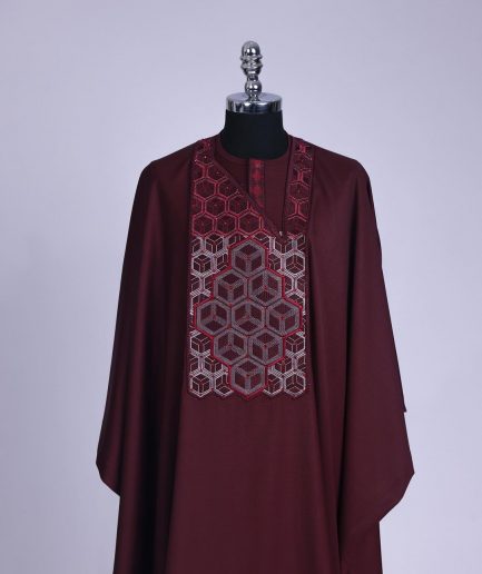 A burgundy, Connected inverted cube -layered 3D embroidery design with splashed burgundy ss30 Swarovski stone details Agbada