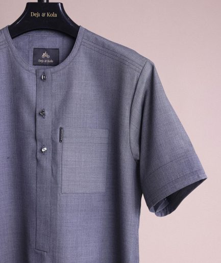 A Light grey, front flap with matching Swarovski button details, short sleeve African senator kaftan native.