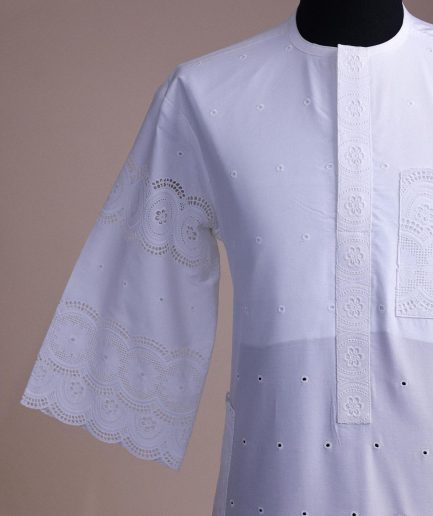 A bright white, Swiss patterned lace, front flap, 3/4 sleeve African kaftan native.