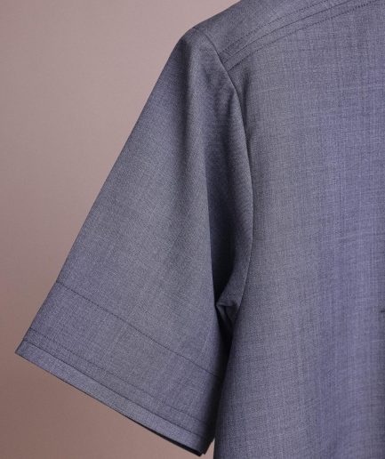 A Light grey, front flap with matching Swarovski button details, short sleeve African senator kaftan native.