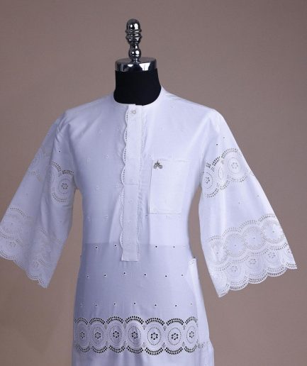 A bright white, Swiss patterned lace, front flap with side pattern, Swarovski button, 3/4 sleeve African kaftan native.