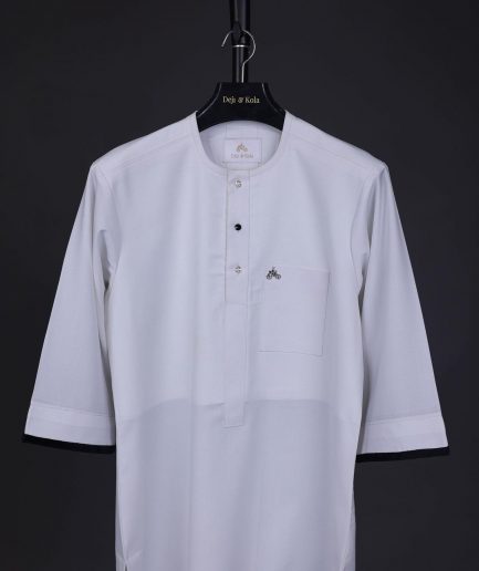 A white, front flap with mixed Swarovski button,3/4 sleeve with velvet cuff details African senator kaftan Native.
