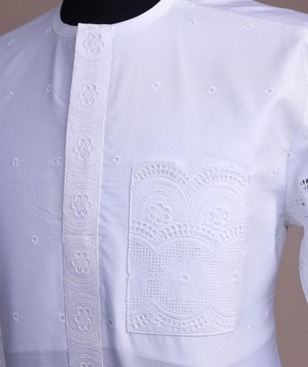 A bright white, Swiss patterned lace, front flap, 3/4 sleeve African kaftan native.