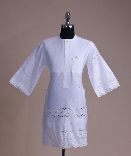 A bright white, Swiss patterned lace, front flap with left side pattern, Swarovski button, 3/4 sleeve African kaftan.