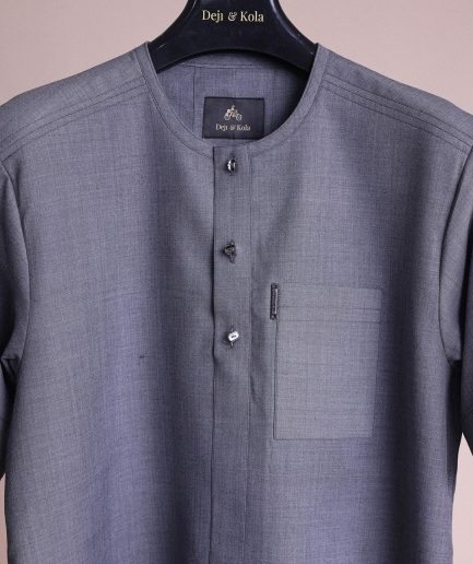 A Light grey, front flap with matching Swarovski button details, short sleeve African senator kaftan native.
