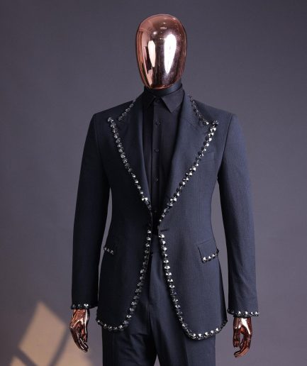 A steel black, seer sucker fabric, knitted, peak lapel suit