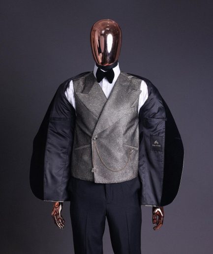 A Gold, black and silver mix metallic jacquard, peak lapel tuxedo suit