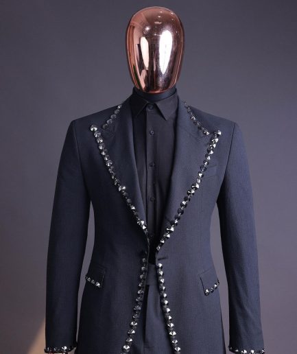 A steel black, seer sucker fabric, knitted, peak lapel suit