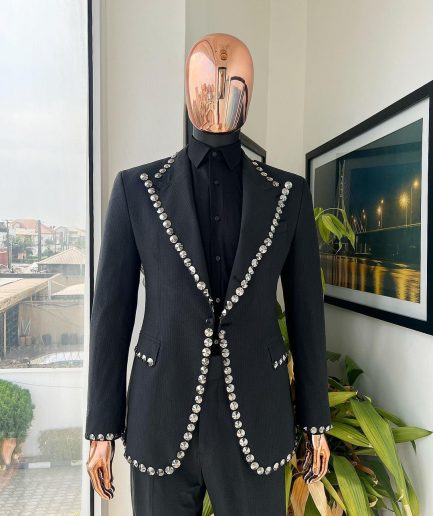 A steel black, seer sucker fabric, knitted, peak lapel suit