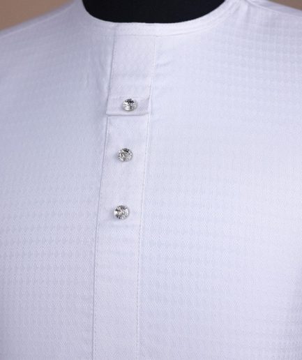 A bright white, front flap with Swarovski button, invisible zip line neck details, short sleeve African kaftan