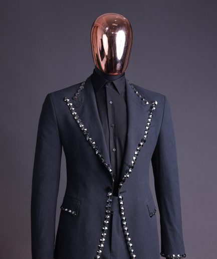 A steel black, seer sucker fabric, knitted, peak lapel suit