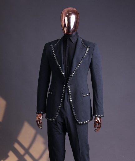 A steel black, seer sucker fabric, knitted, peak lapel suit