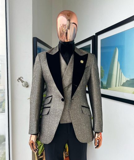 A Gold, black and silver mix metallic jacquard, peak lapel tuxedo suit