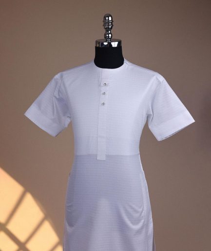 A bright white, front flap with Swarovski button, invisible zip line neck details, short sleeve African kaftan