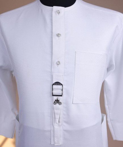 A Bright white, front flap with Swarovski button & metal tag details, 3/4 sleeve African kaftan