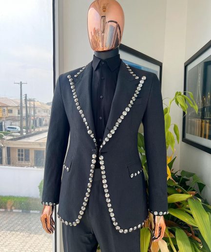 A steel black, seer sucker fabric, knitted, peak lapel suit