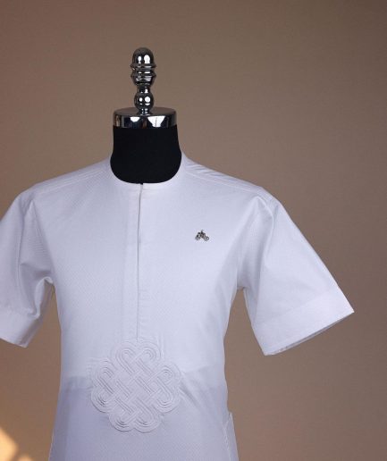 A bright white, zip line with embroidery details, short sleeve African kaftan